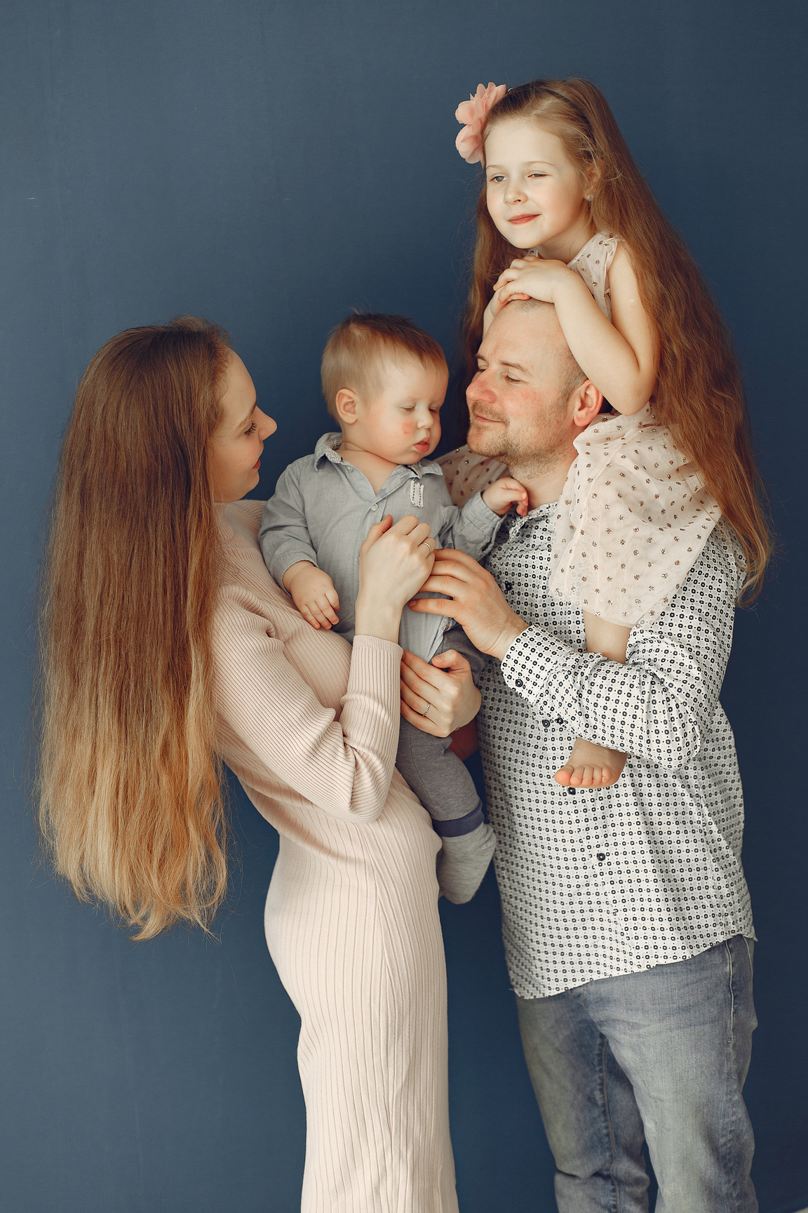 Beautiful Family Posing For A Photoshoot